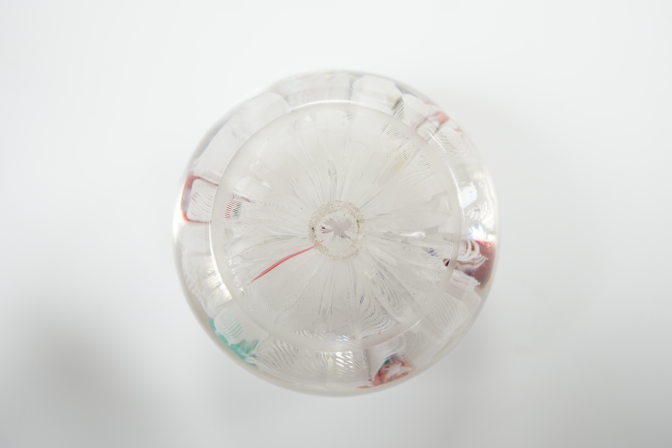 A Baccarat glass upset muslin paperweight, 6cm in diameter